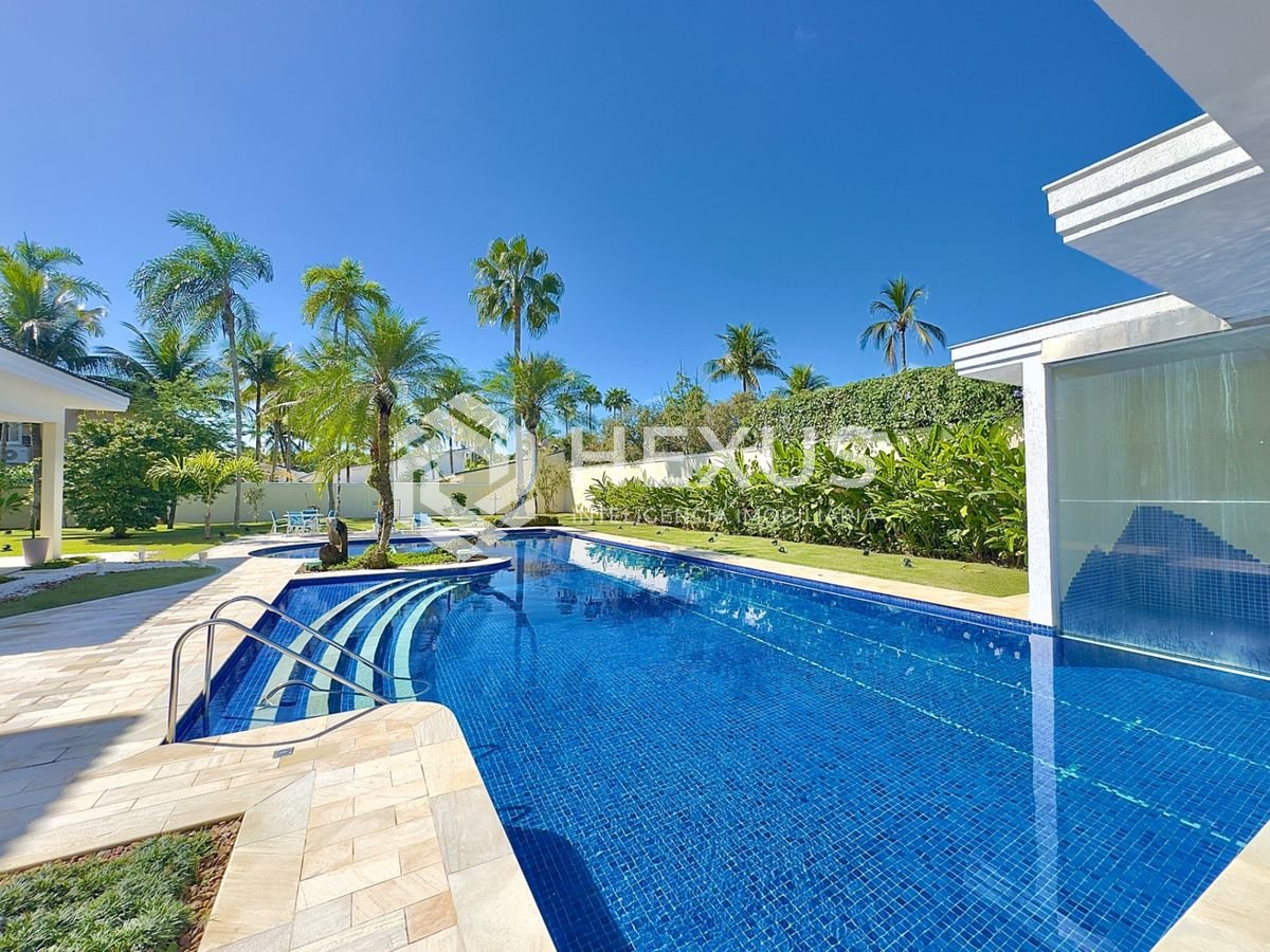 Foto 3 de Casa reformada com piscina e área gourmet no Jardim Acapulco, Guarujá