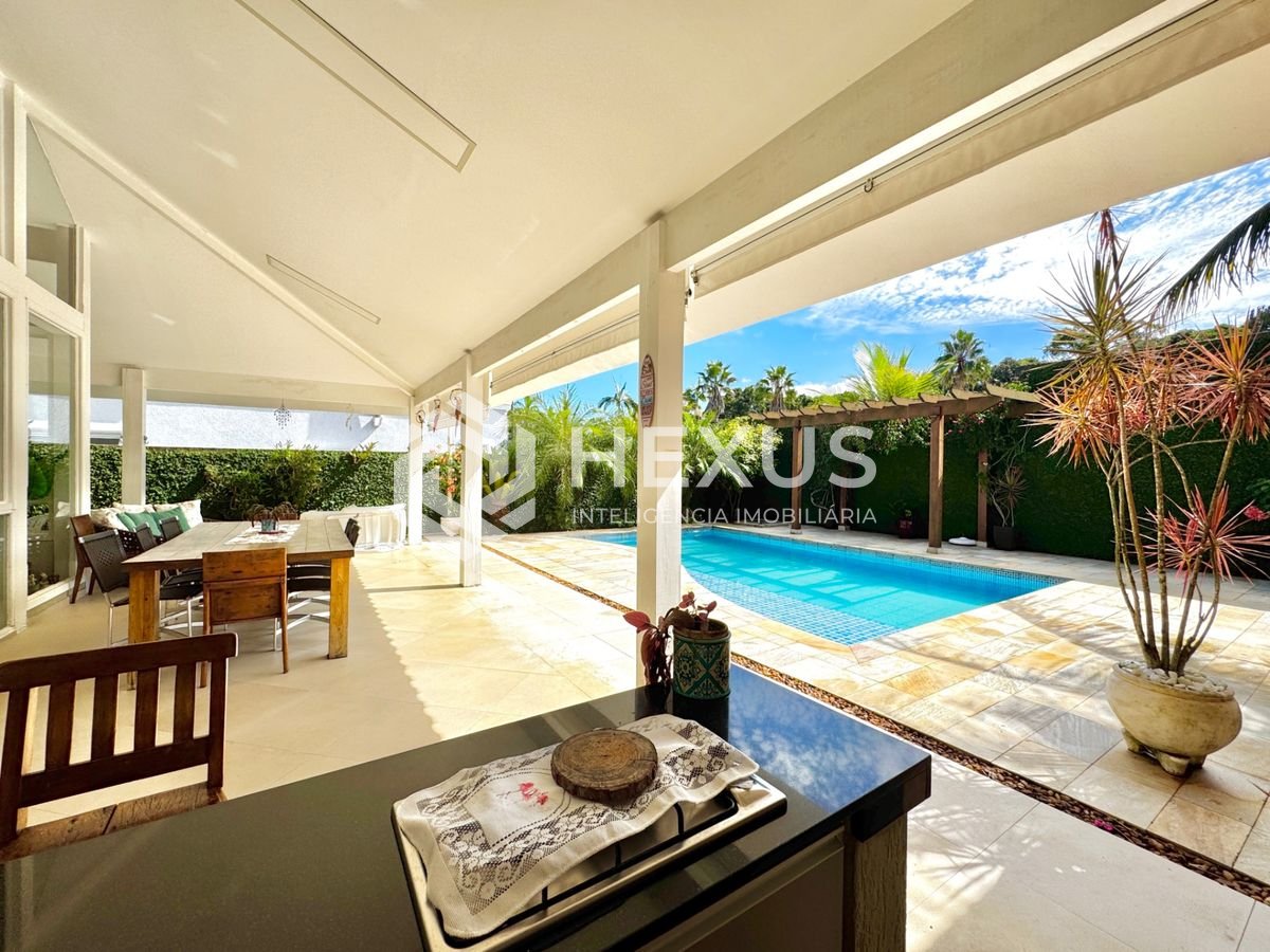 Foto 4 de Casa reformada com piscina e área gourmet no Jardim Acapulco, Guarujá