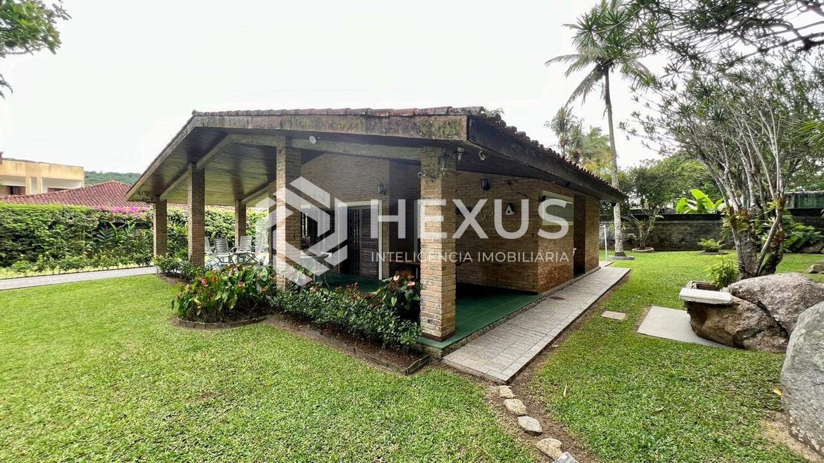 Foto 5 de Casa com lago área gourmet e piscina no Jardim Guaiuba, Guarujá