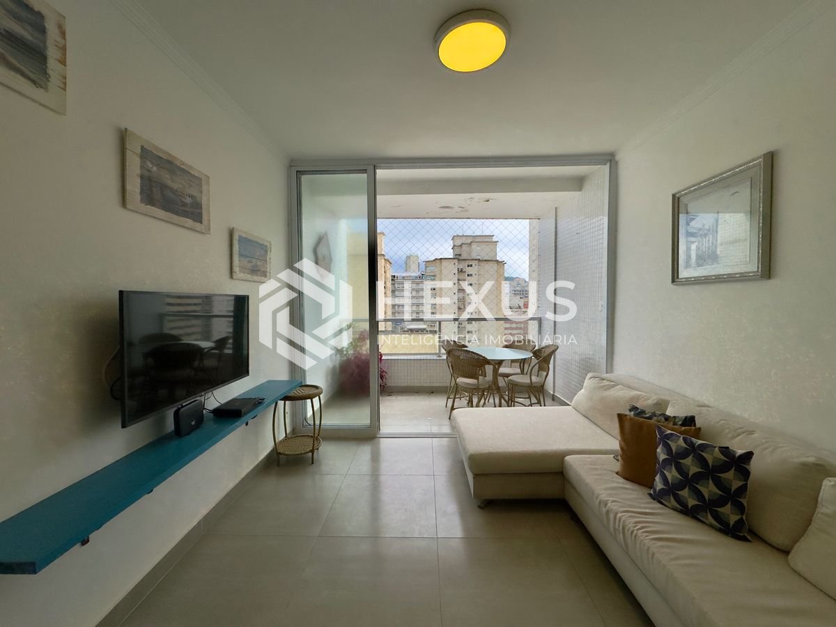 Foto 4 de Apartamento reformado com varanda vista mar na beira mar nas Pitangueiras, Guarujá
