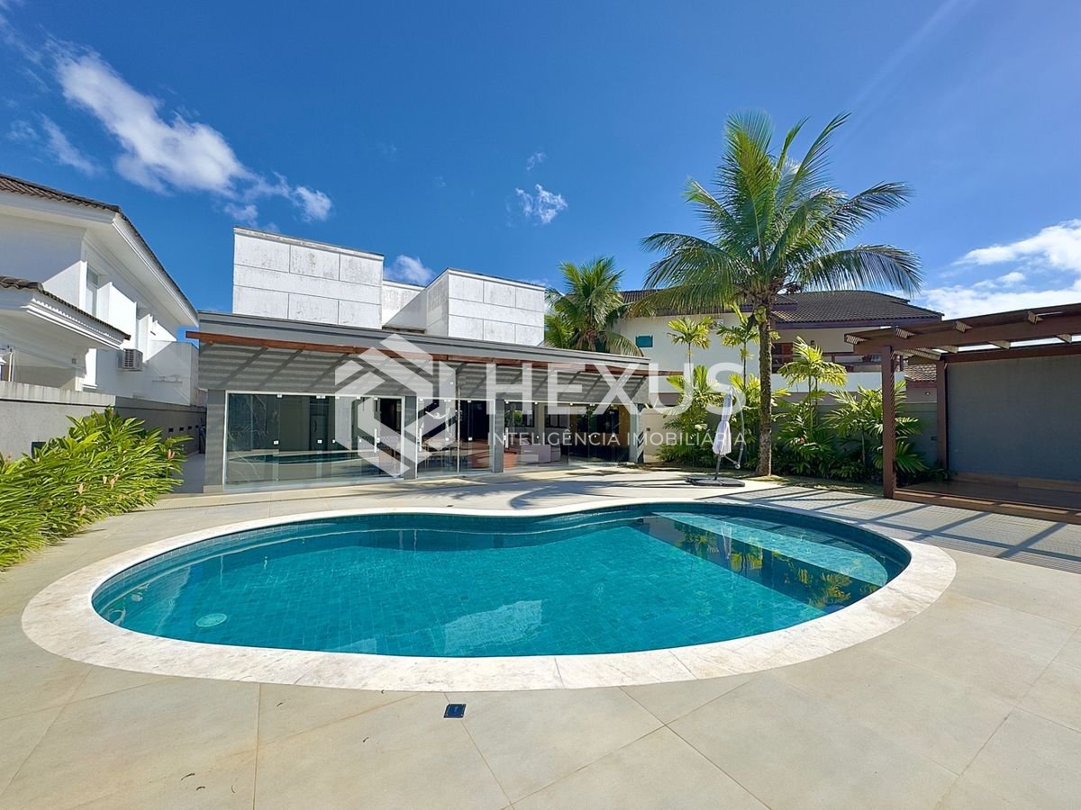 Foto 2 de Casa reformada com piscina e área gourmet no Jardim Acapulco, Guarujá