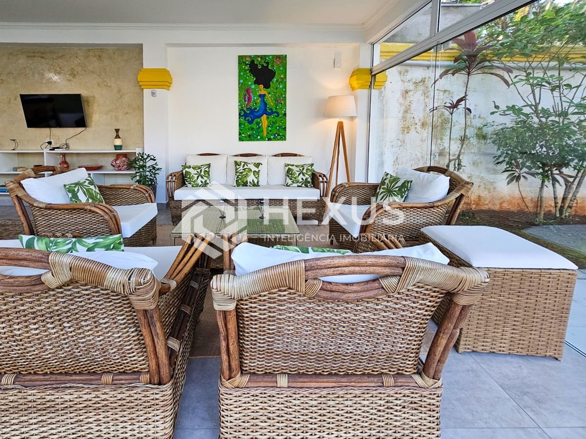 Foto 3 de Casa com piscina e churrasqueira no Balneário Pernambuco, Guarujá