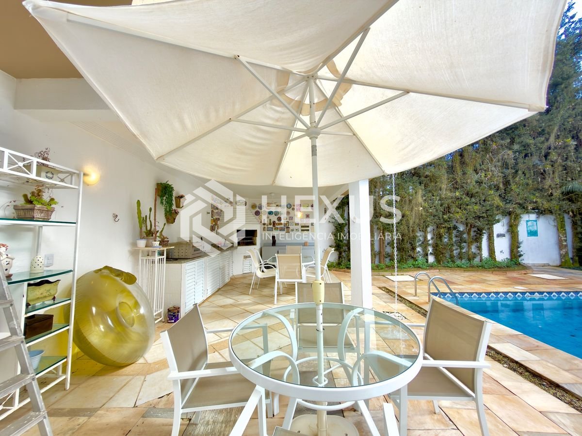 Foto 3 de Casa com piscina e área gourmet no Jardim Acapulco, Guarujá