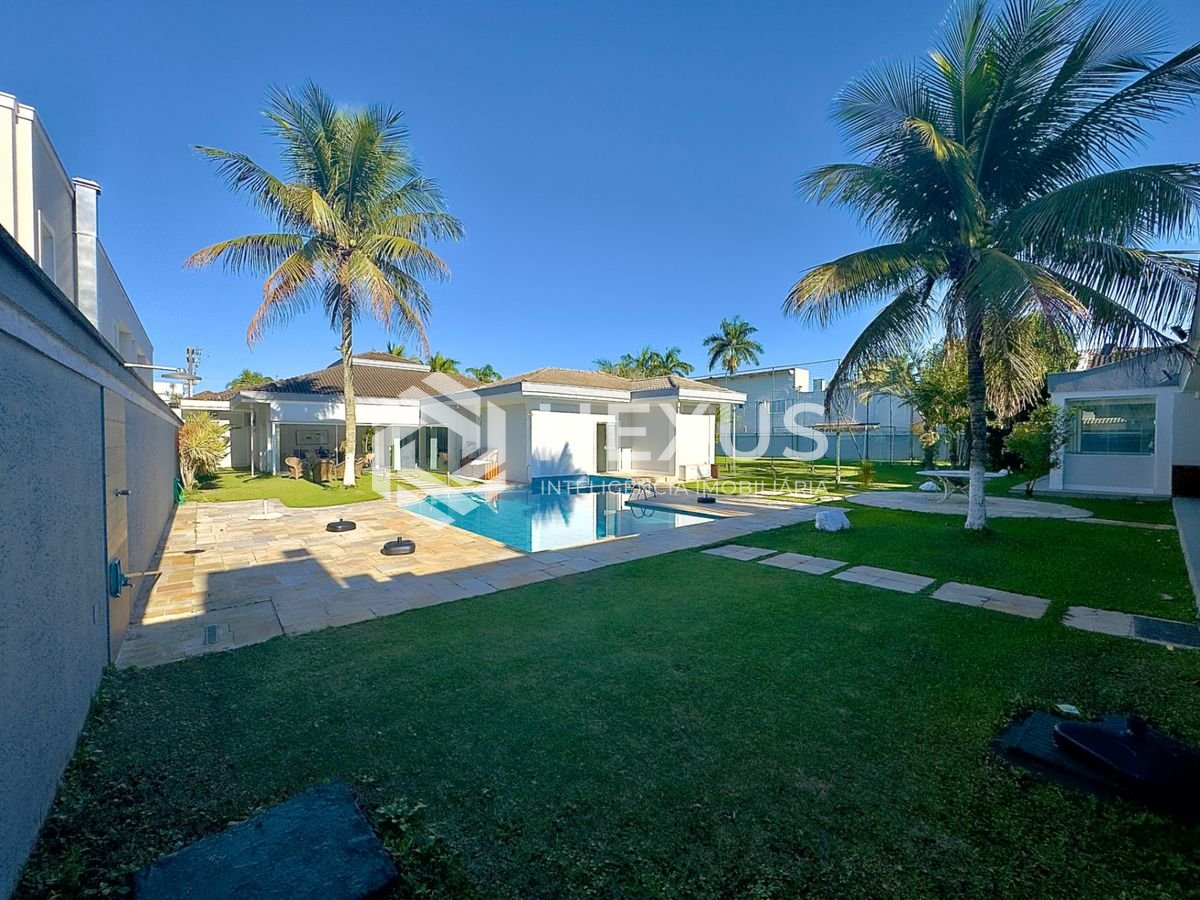 Foto 5 de Casa reformada com piscina e área gourmet no Jardim Acapulco, Guarujá