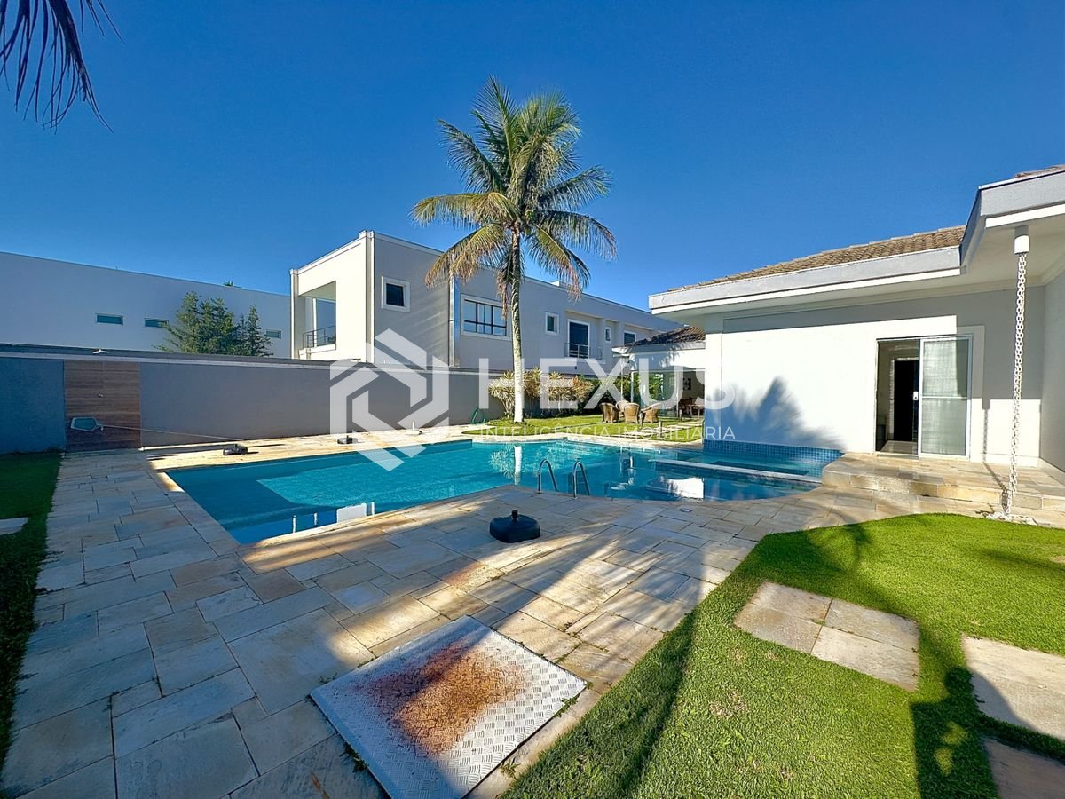 Foto 4 de Casa reformada com piscina e área gourmet no Jardim Acapulco, Guarujá