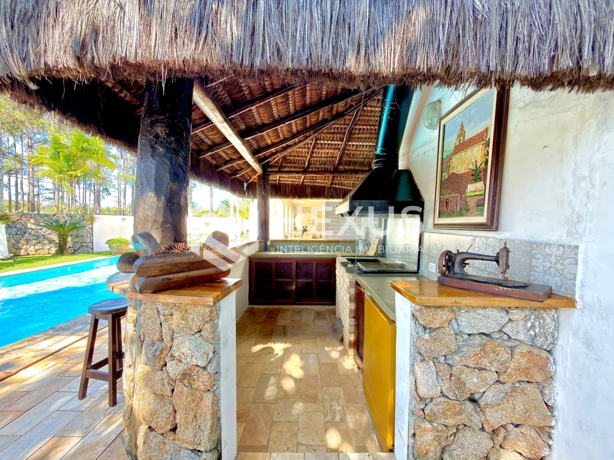 Foto 3 de Casa de alto padrão com piscina e área gourmet no Jardim Acapulco, Guarujá