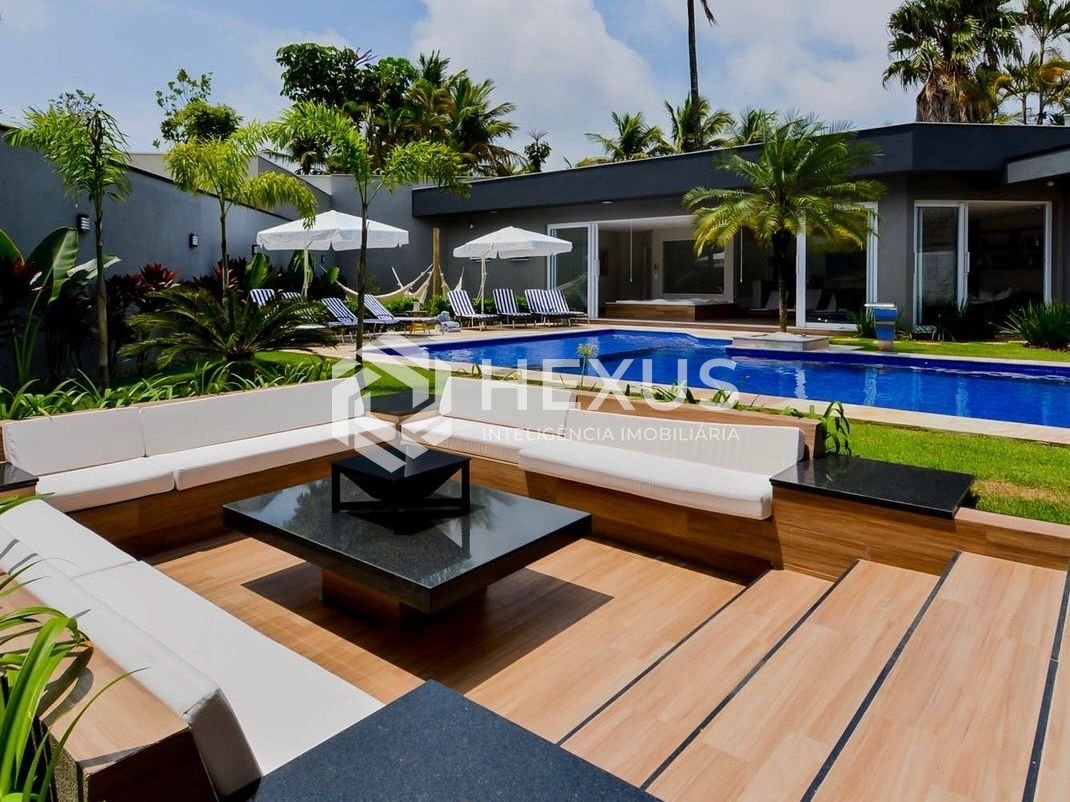 Foto 5 de Casa de alto padrão com piscina e área gourmet no Jardim Acapulco à venda, Guarujá-SP.