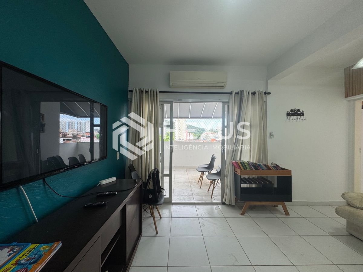 Foto 2 de Apartamento com varanda e lazer a 250m da praia na Enseada, Guarujá