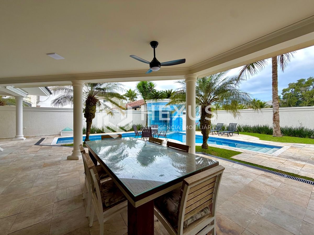 Foto 5 de Casa de alto padrão com piscina e área gourmet no Jardim Acapulco, Guarujá.