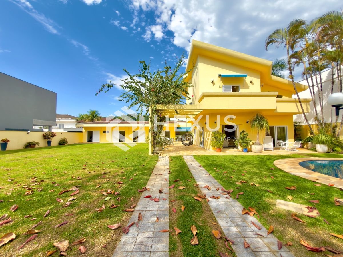 Foto 3 de Casa de alto padrão com piscina e área gourmet no Jardim Acapulco, Guarujá