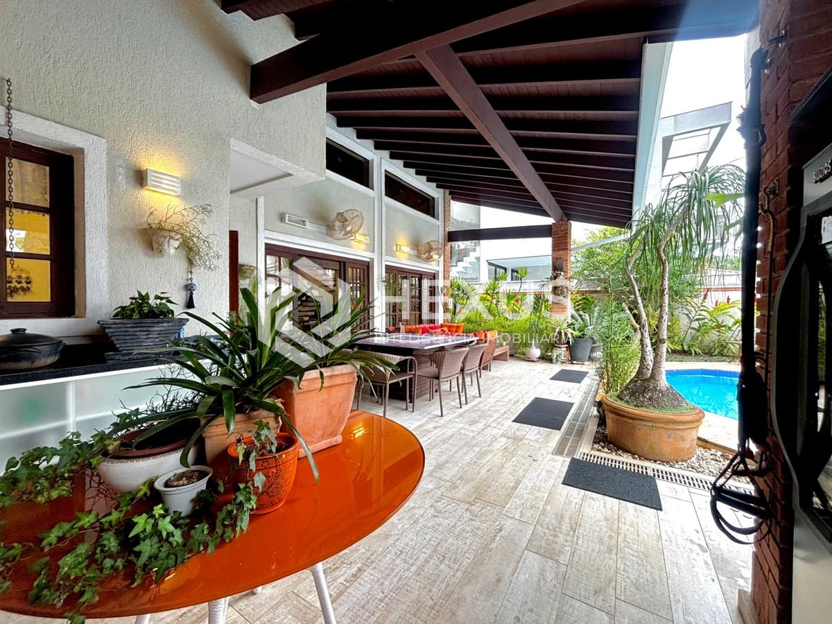 Foto 4 de Casa com piscina e área gourmet no Jardim Acapulco, Guarujá