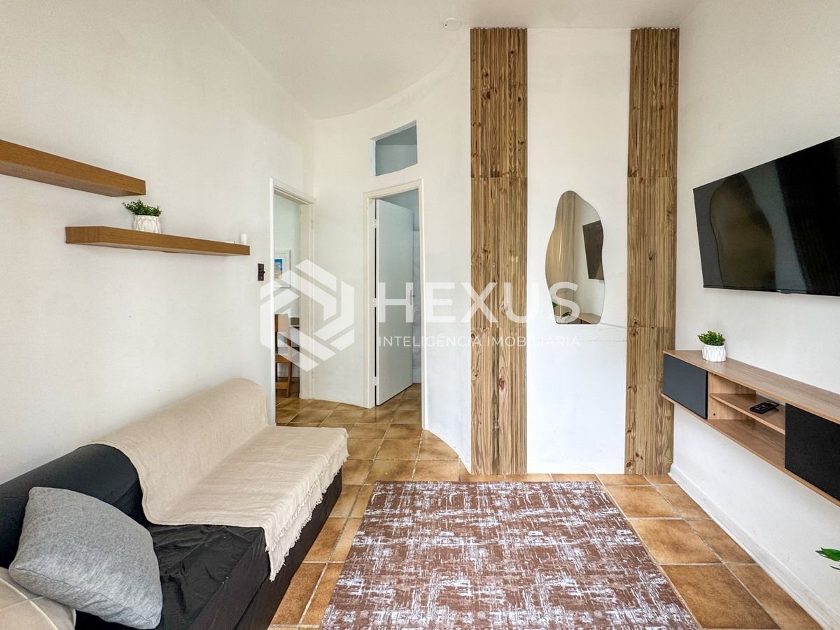 Foto 4 de Apartamento com varanda vista mar e lazer nas Pitangueiras, Guarujá
