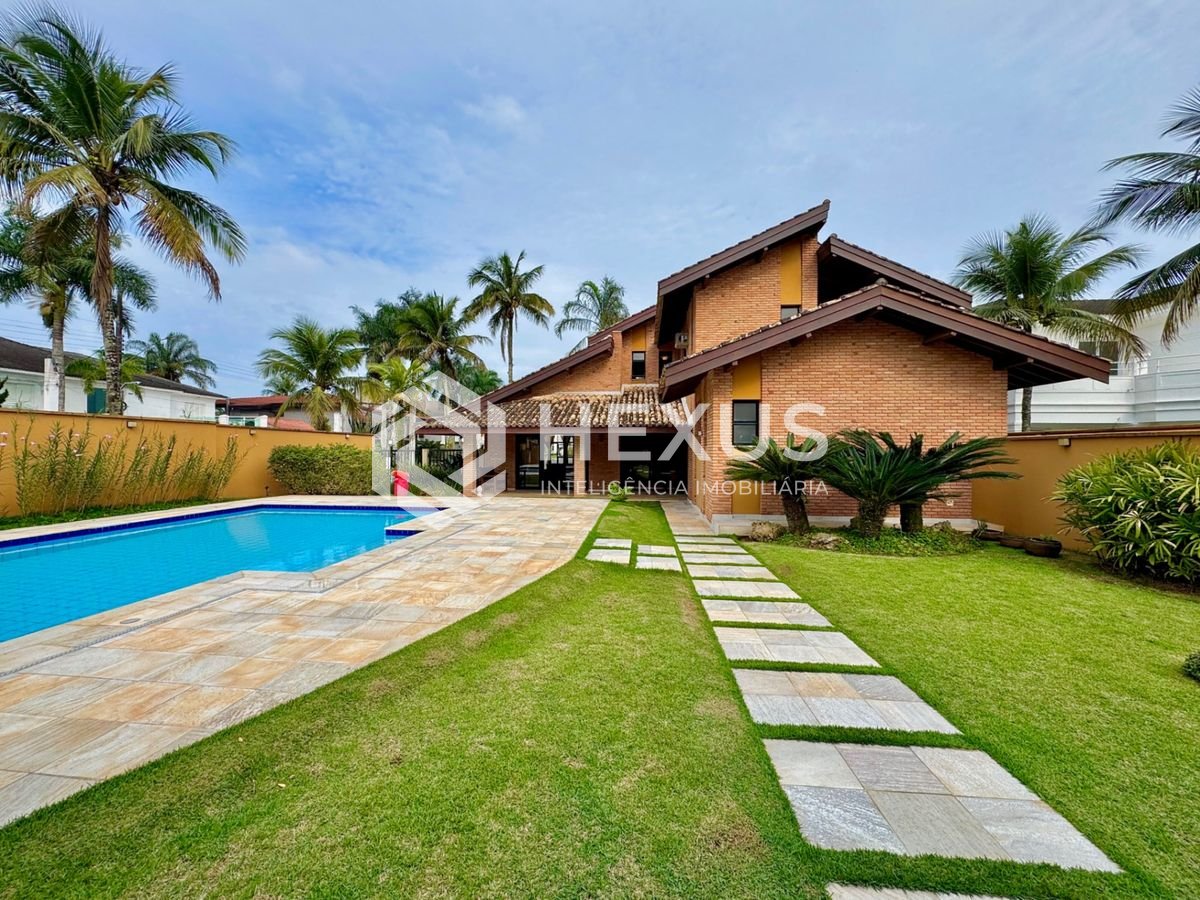 Foto 3 de Casa  com piscina e área gourmet no Jardim Acapulco, Guarujá