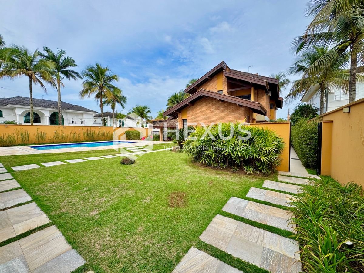 Foto 4 de Casa  com piscina e área gourmet no Jardim Acapulco, Guarujá