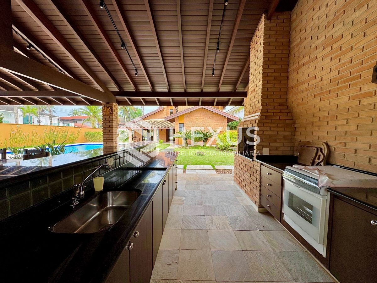 Foto 5 de Casa  com piscina e área gourmet no Jardim Acapulco, Guarujá