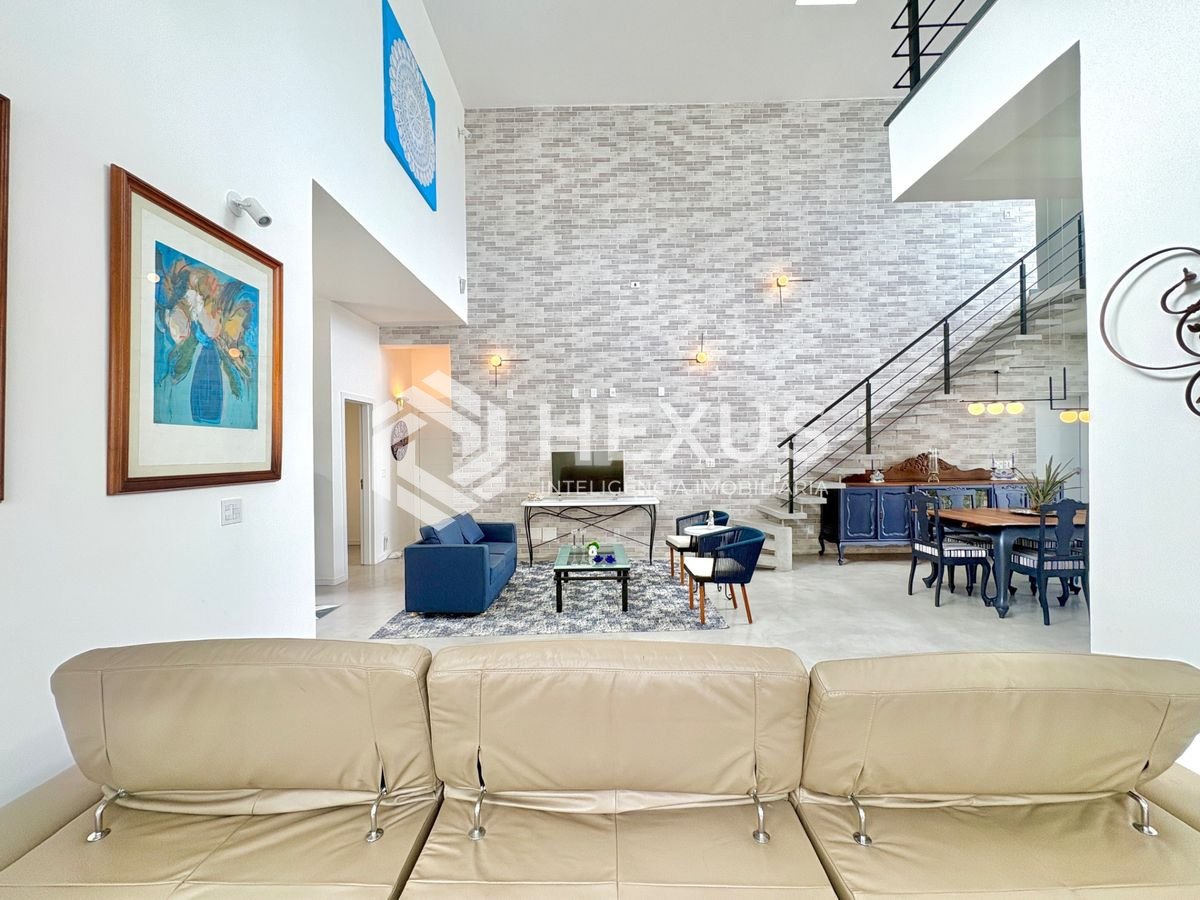 Foto 5 de Casa reformada com piscina e área gourmet no Jardim Acapulco, Guarujá