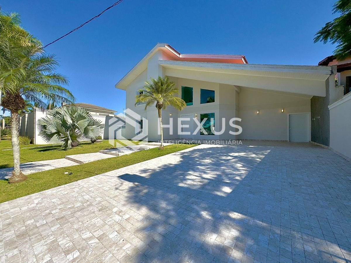 Foto 4 de Casa de alto padrão com varanda piscina e área gourmet no Jardim Acapulco, Guarujá