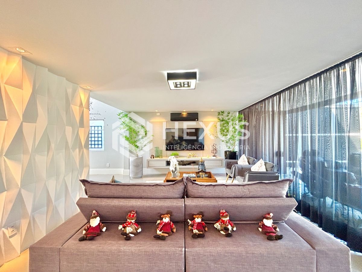 Foto 4 de Casa reformada com piscina e área gourmet no Jardim Acapulco, Guarujá