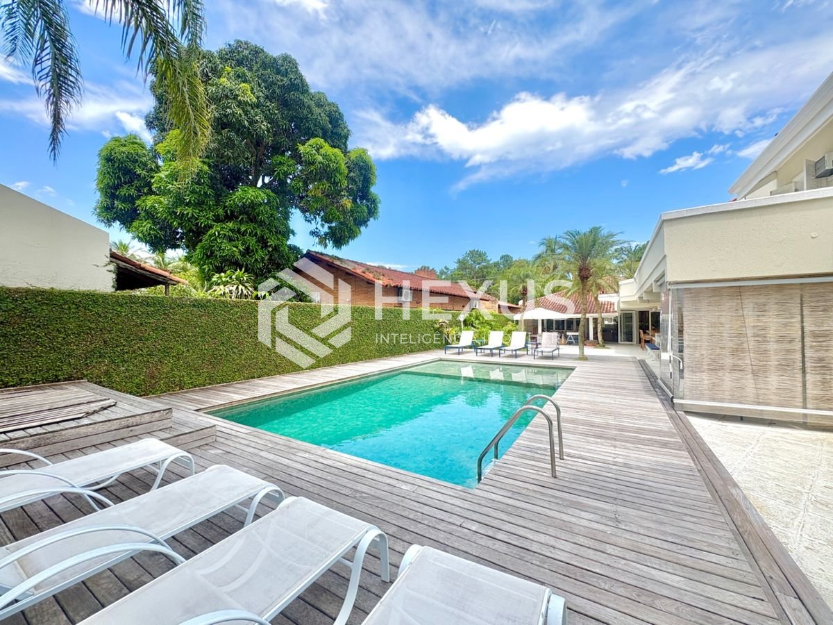Foto 2 de Casa reformada com piscina e área gourmet no Jardim Acapulco, Guarujá