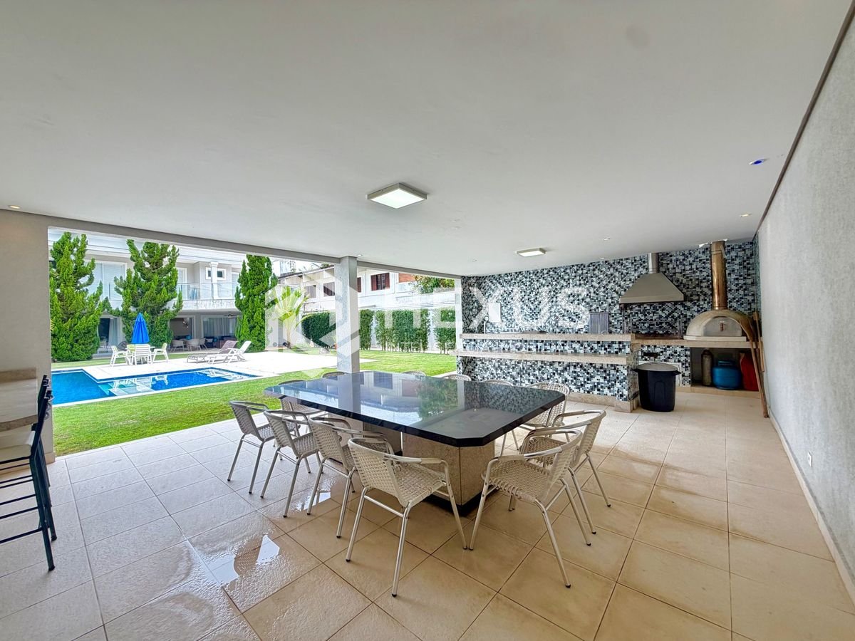 Foto 5 de Mansão de alto padrão reformada com varanda piscina e área gourmet no Acapulco, Guarujá