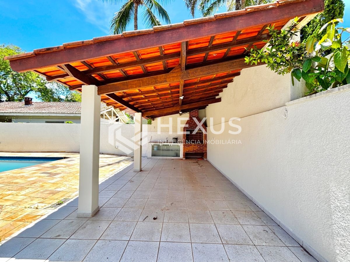 Foto 4 de Casa com piscina e área gourmet no Jardim Acapulco, Guarujá