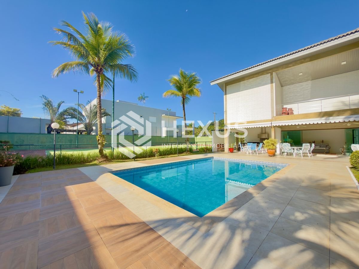 Foto 3 de Casa de alto padrão com piscina e área gourmet no Jardim Acapulco, Guarujá