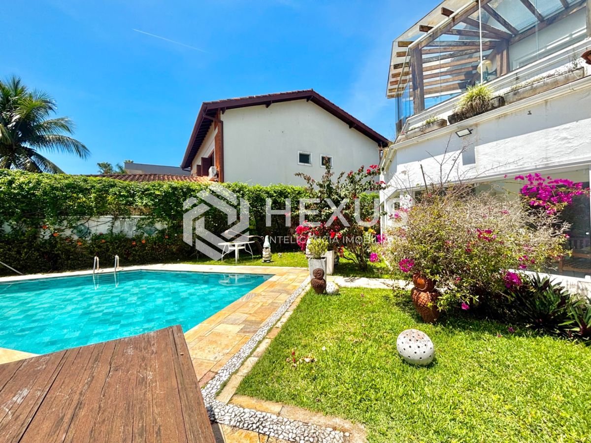 Foto 4 de Casa com piscina e área gourmet no Jardim Acapulco, Guarujá