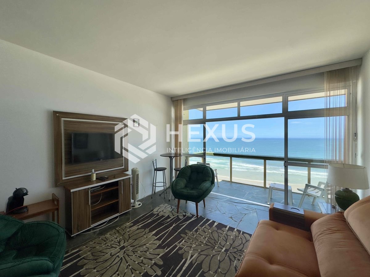 Foto 3 de Apartamento frente mar com varanda e vista na Praia das Pitangueiras, Guaruja