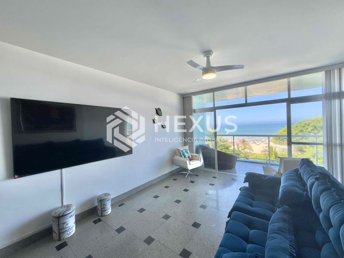 Foto 4 de Apartamento frente mar com varanda e vista mar na Praia das Pitangueira, Guaruja