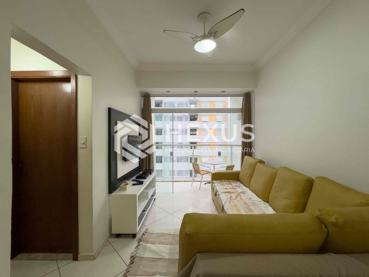 Foto 3 de Apartamento com varanda e vista livre a uma quadra da Praia das Pitangueiras de 2 quartos com 1 vaga, Guarujá-SP