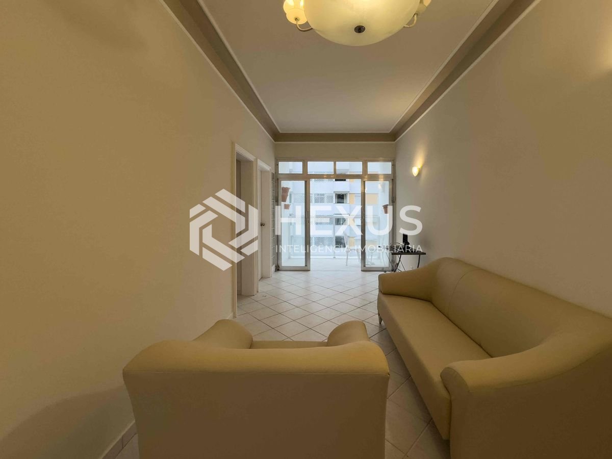 Foto 4 de Apartamento com varanda e vista livre a uma quadra da Praia das Pitangueiras de 2 quartos com 1 vaga, Guarujá-SP