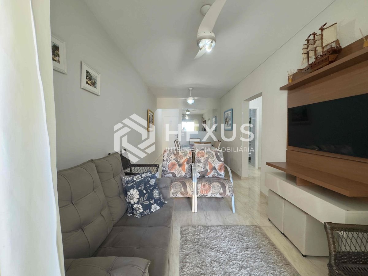 Foto 4 de Apartamento com varanda e vista mar a uma quadra da Praia das Pitangueiras de 2 quartos com 1 vaga, Guarujá-SP