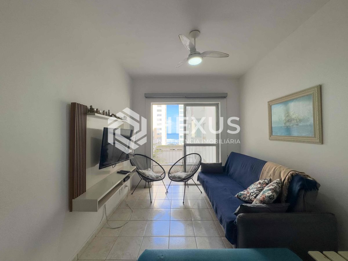Foto 2 de Apartamento com varanda e vista mar a uma quadra da Praia das Pitangueiras de 2 quartos com 1 vaga, Guarujá-SP.
