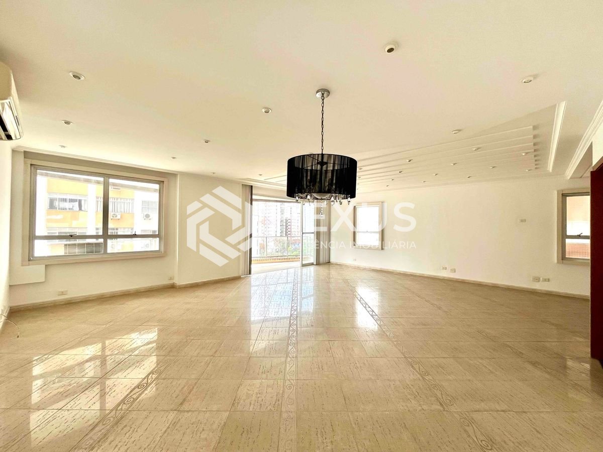 Foto 3 de Apartamento com varanda e vista mar a duas quadras da Praia das Pitangueiras, Guarujá-SP - 3 Quartos (1 Suíte), 2 Vagas | Hexus Inteligência Imobiliária