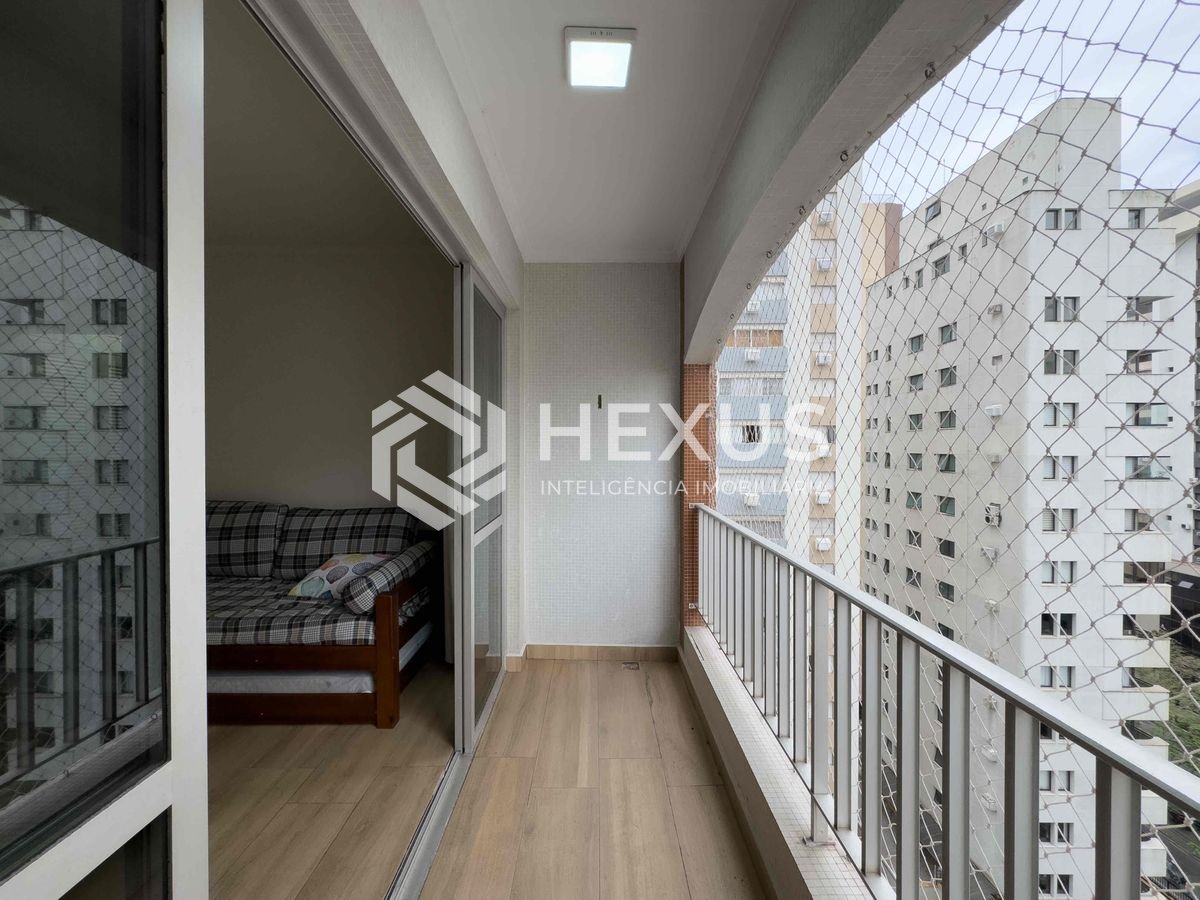 Foto 5 de Apartamento com varanda e vista livre a duas quadras da Praia das Pitangueiras, Guarujá-SP - 1 Quarto, 1 Vaga | Hexus Inteligência Imobiliária