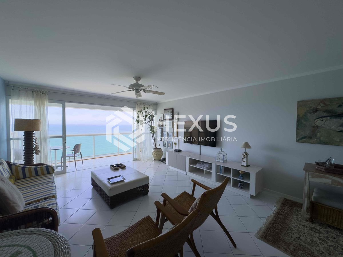 Foto 4 de Apartamento reformado frente mar com varanda na Praia das Pitangueiras, Guaruja