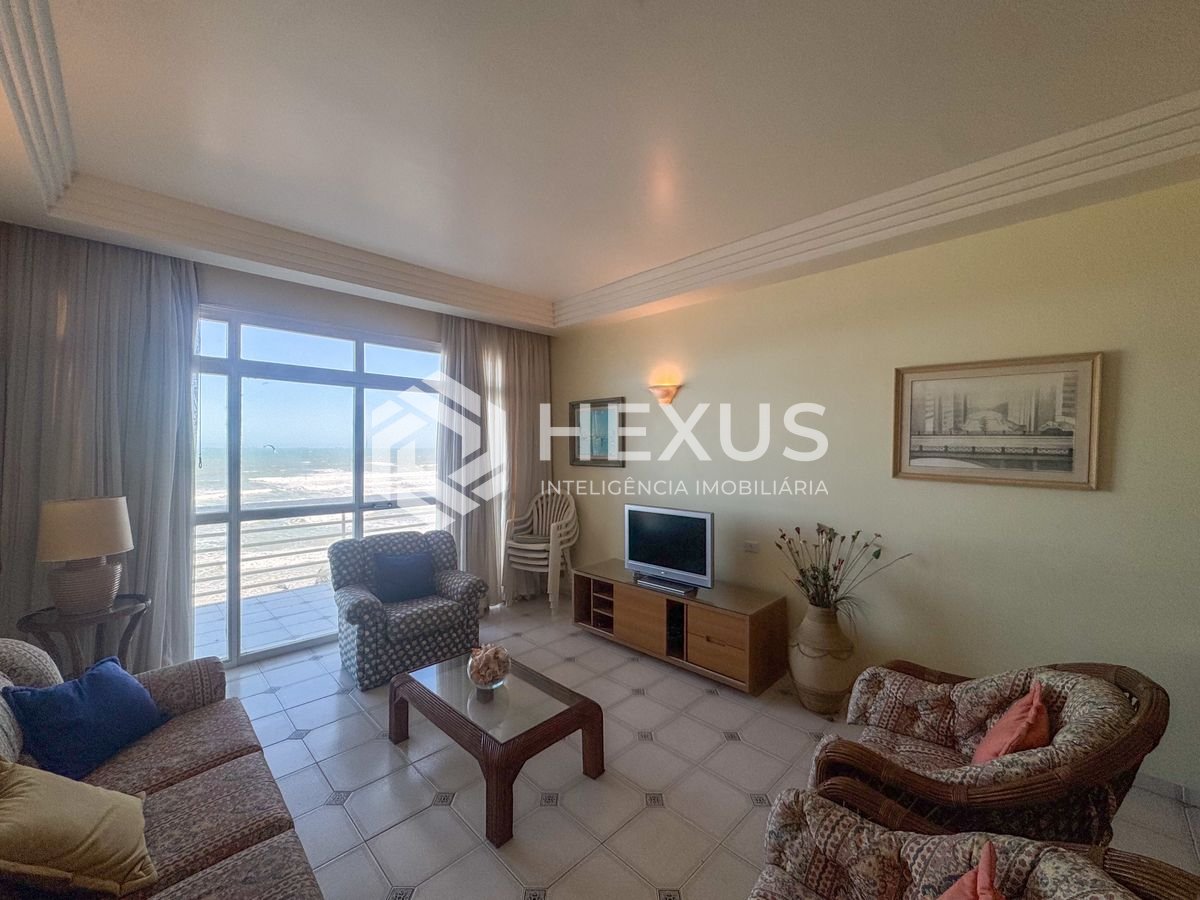 Foto 3 de Apartamento frente mar com varanda e vista mar na Praia das Pitangueiras, Guaruja