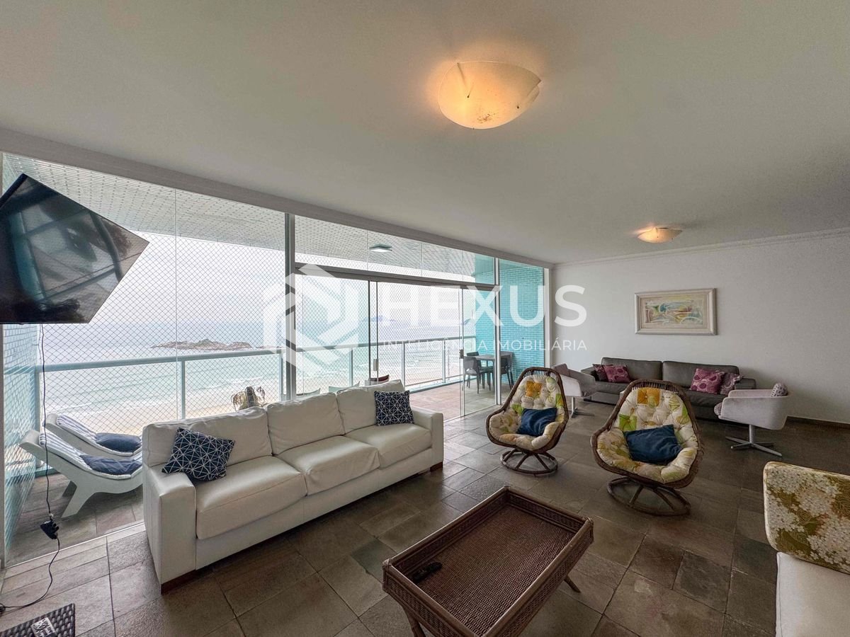 Foto 3 de Apartamento frente mar com varanda e vista mar na Praia das Pitangueiras, Guaruja