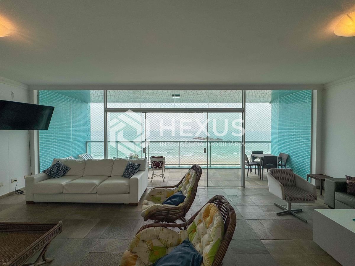 Foto 5 de Apartamento frente mar com varanda e vista mar na Praia das Pitangueiras, Guaruja