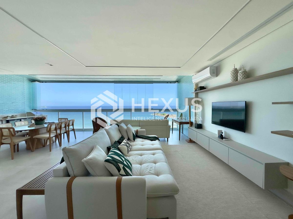 Foto 4 de Apartamento frente mar reformado com varanda e vista mar na Praia das Pitangueiras, Guaruja