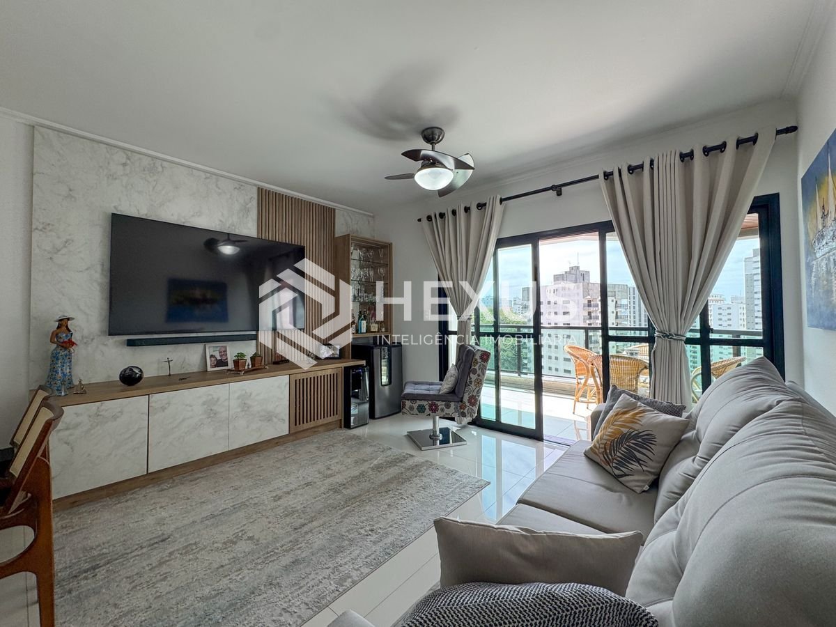 Foto 2 de Apartamento reformado com varanda e lazer na Praia das Asturias, Guaruja
