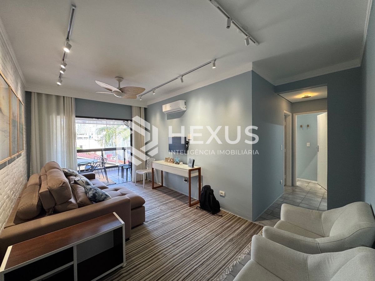 Foto 2 de Apartamento reformado e mobiliado com varanda a venda na praia das Asturias, Guaruja