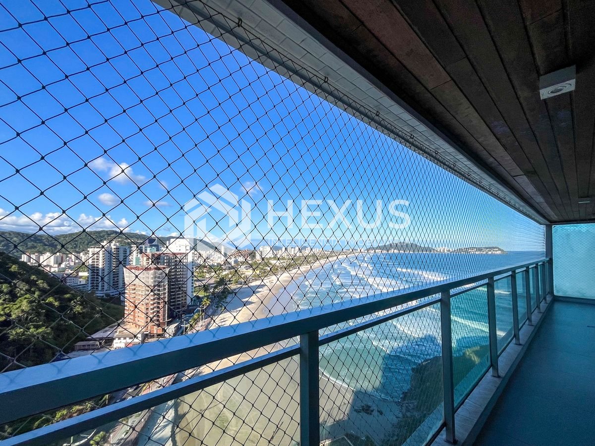 Foto 3 de Apartamento frente mar com varanda e lazer na Praia das Pitangueiras, Guaruja