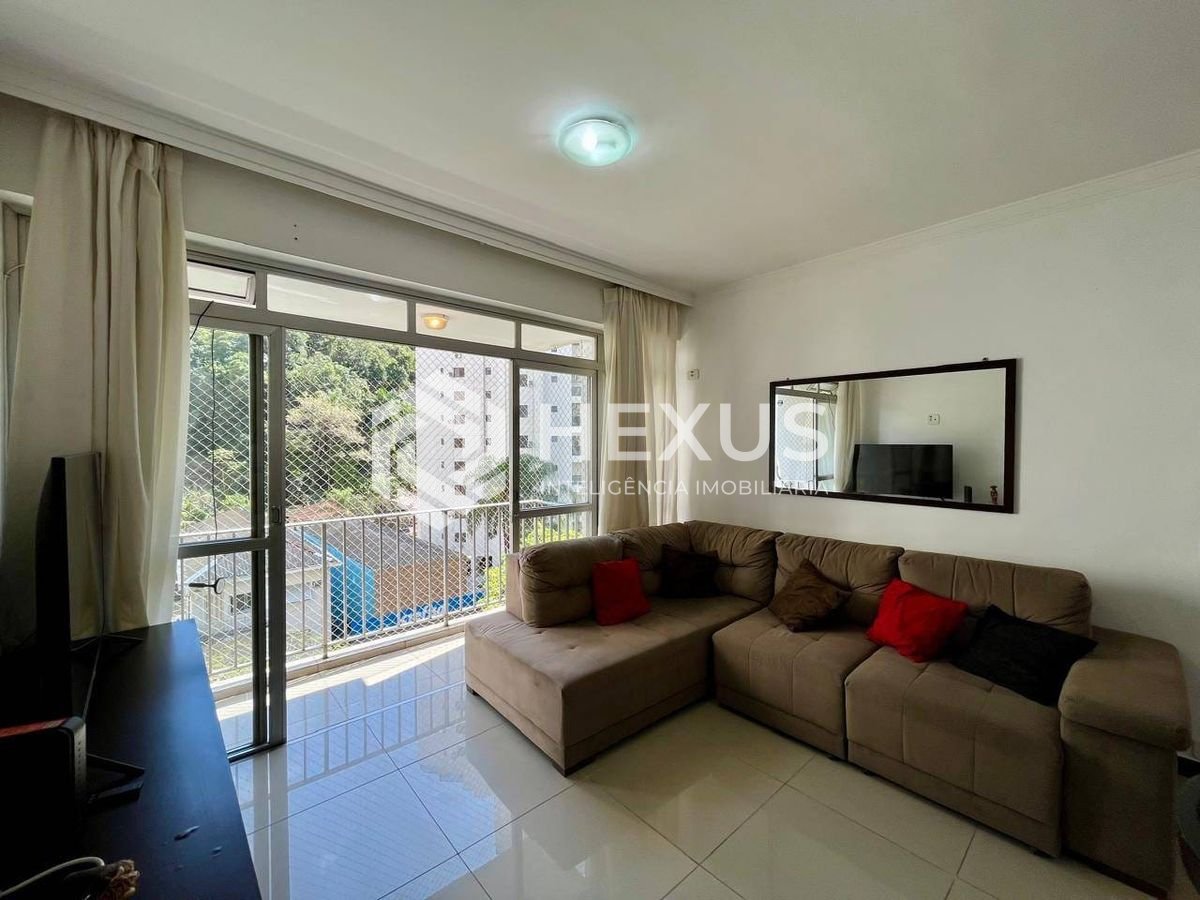 Foto 5 de Apartamento reformado com varanda e lazer na Praia das Pitangueiras, Guaruja