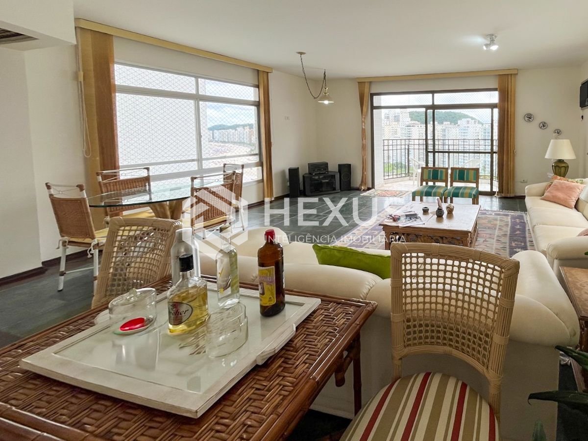 Foto 4 de Apartamento frente mar com varanda e vagas na Praia das Pitangueiras, Guaruja
