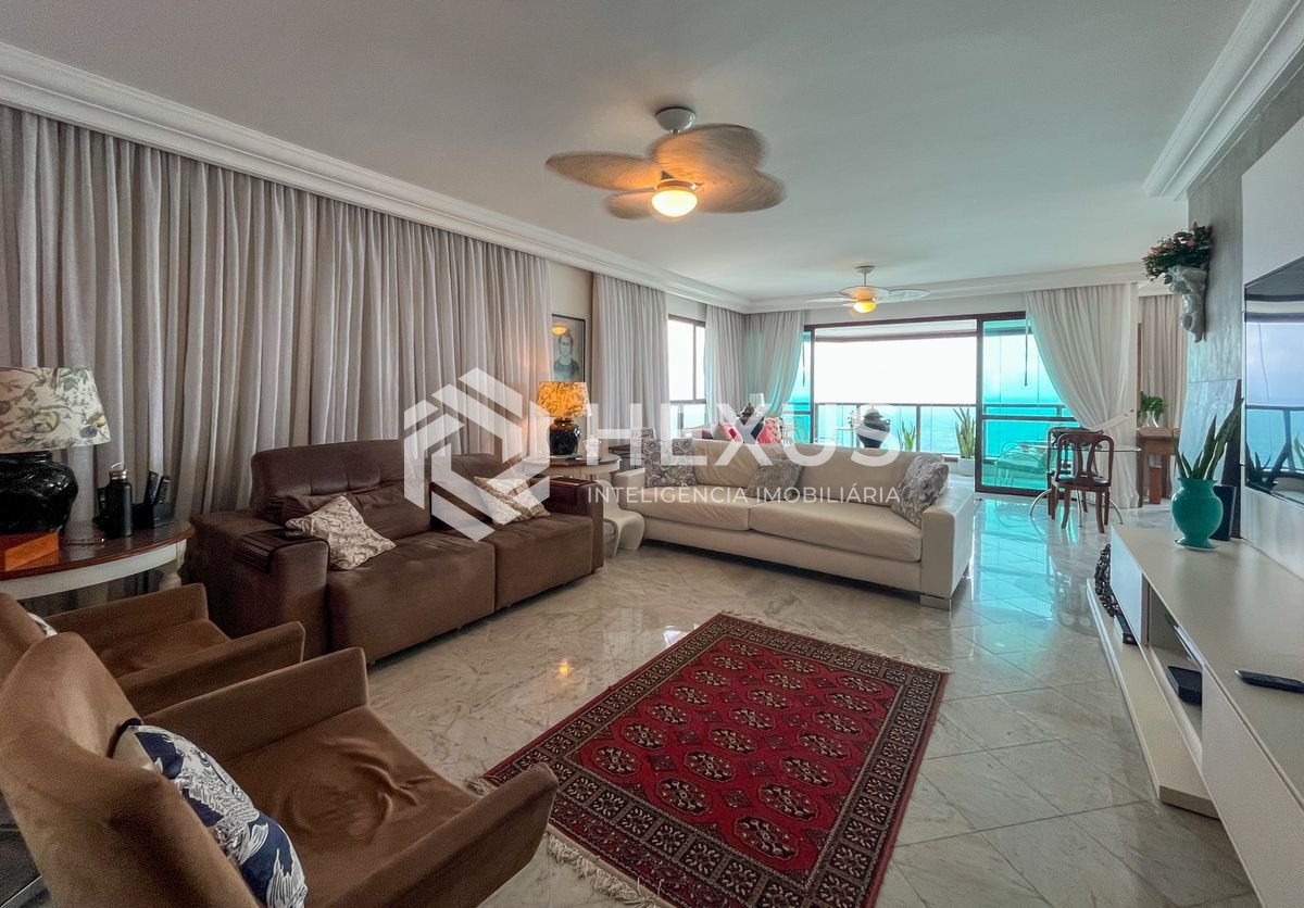 Foto 3 de Apartamento frente mar com varanda e lazer na Praia das Pitangueiras, Guaruja