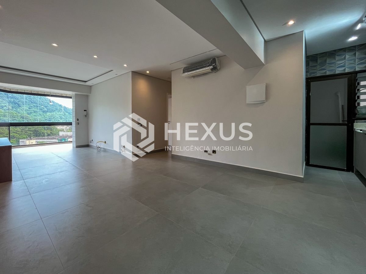 Foto 4 de Apartamento reformado beira mar com varanda e lazer na Praia da Enseada, Guaruja
