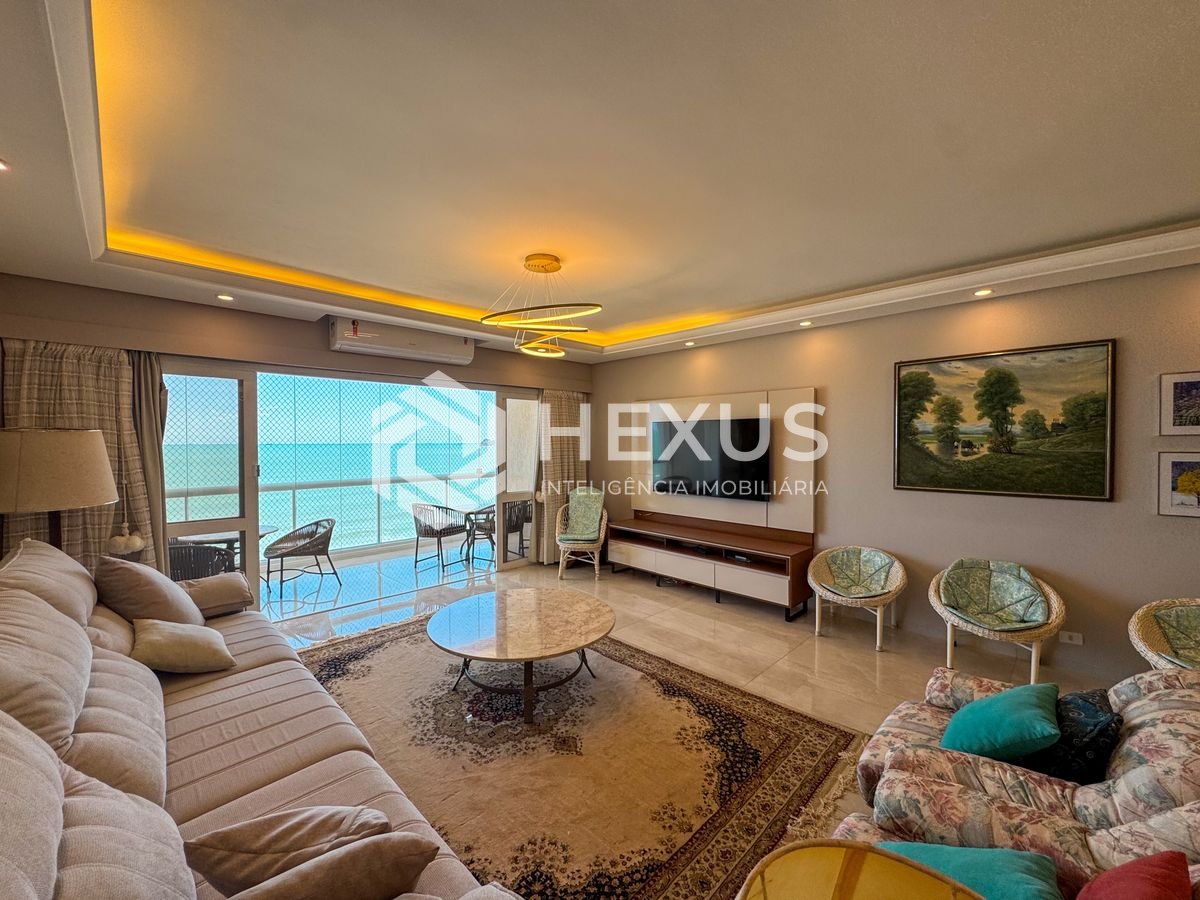 Foto 2 de Apartamento reformado frente mar com varanda na Praia das Pitangueiras, Guarujá