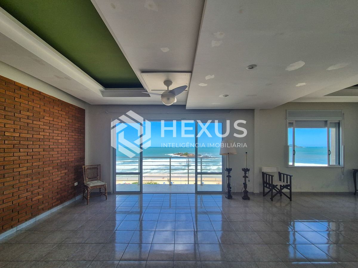 Foto 2 de Apartamento frente mar reformado com varanda e lazer na Praia das Pitangueiras, Guaruja