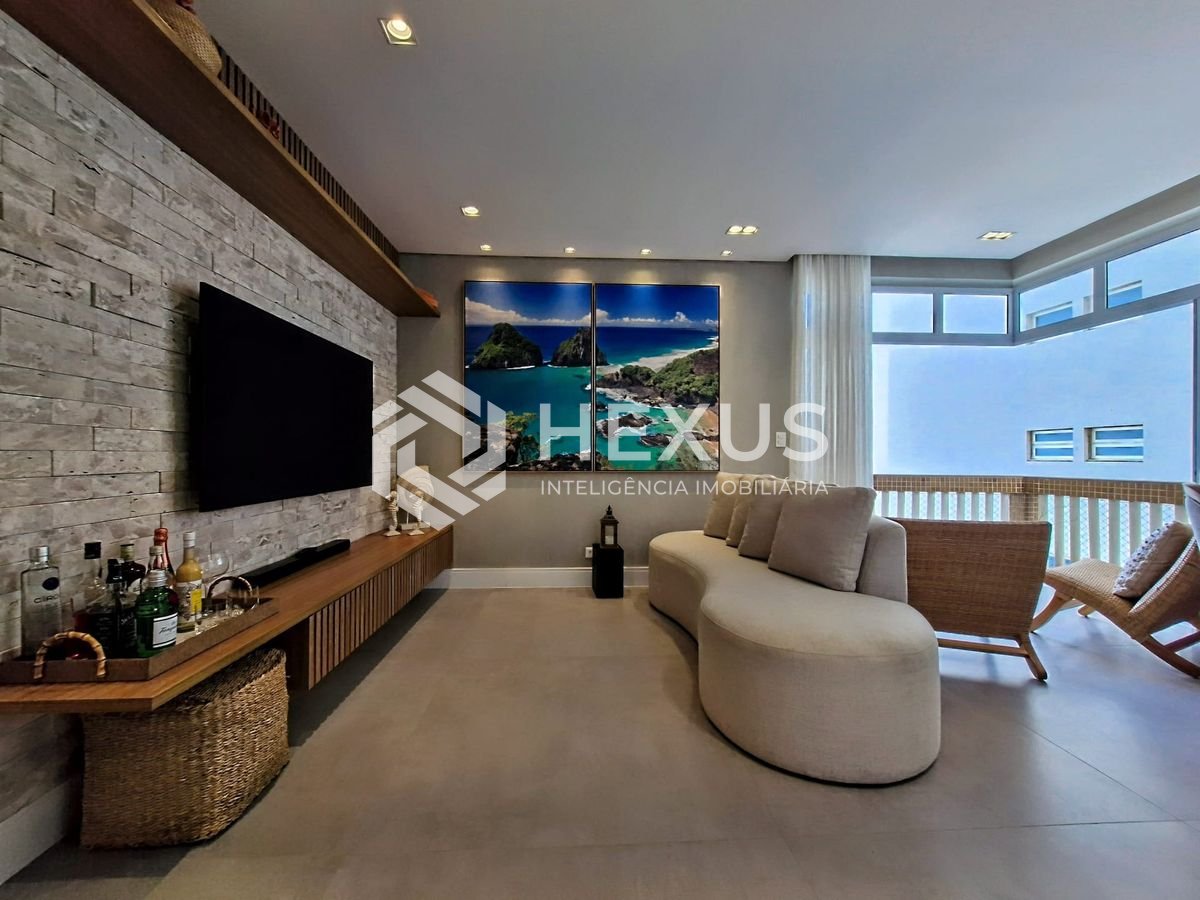 Foto 4 de Apartamento reformado frente mar com varanda na Praia das Pitangueiras, Guaruja